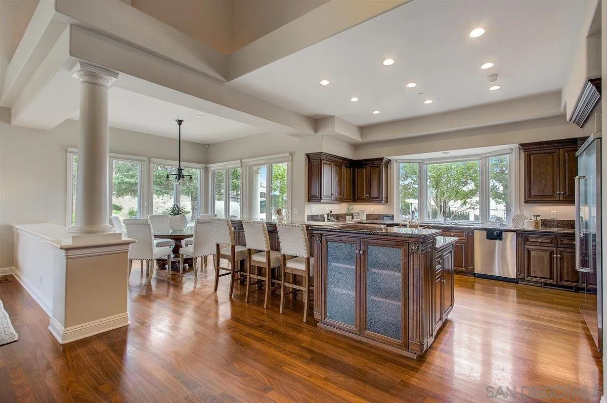 4349 Fallsbrae Road Fallbrook, CA 92028 - Photo 12 of 68 a kitchen with lots of counter top space and stainless steel appliances