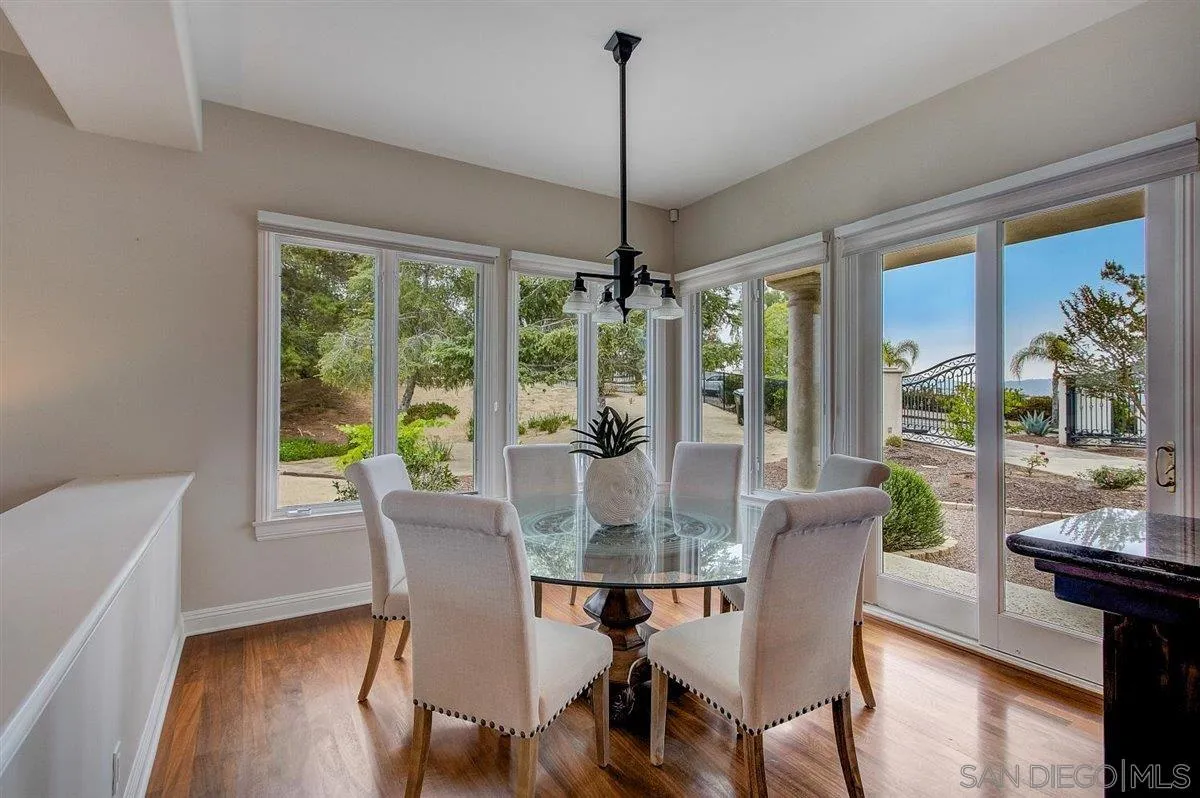 4349 Fallsbrae Road Fallbrook, CA 92028 - Photo 13 of 68 a dining room with furniture window wooden floor