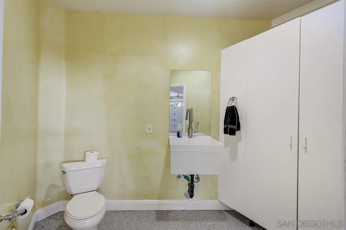 4349 Fallsbrae Road Fallbrook, CA 92028 - Photo 18 of 68 a bathroom with a toilet and a sink