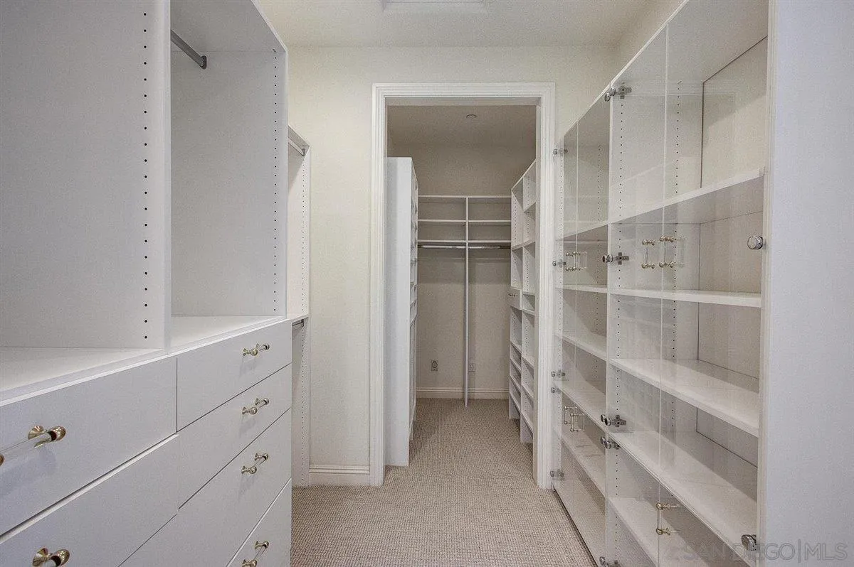 4349 Fallsbrae Road Fallbrook, CA 92028 - Photo 25 of 68 a view of an empty walk in closet
