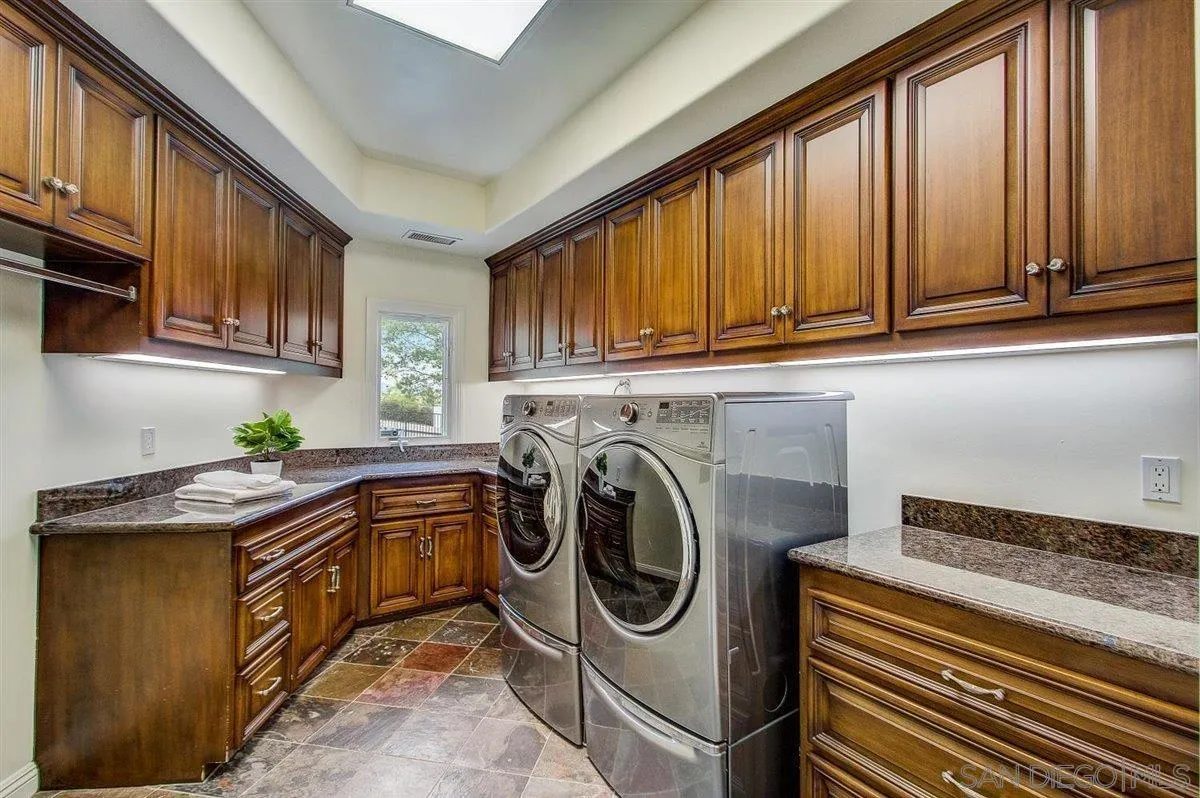 4349 Fallsbrae Road Fallbrook, CA 92028 - Photo 27 of 68 a utility room with sink dryer and washer