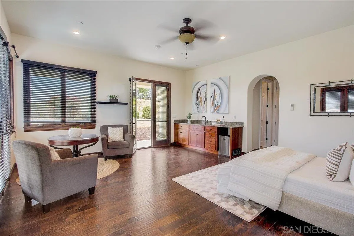 4349 Fallsbrae Road Fallbrook, CA 92028 - Photo 30 of 68 a living room with furniture and a fireplace