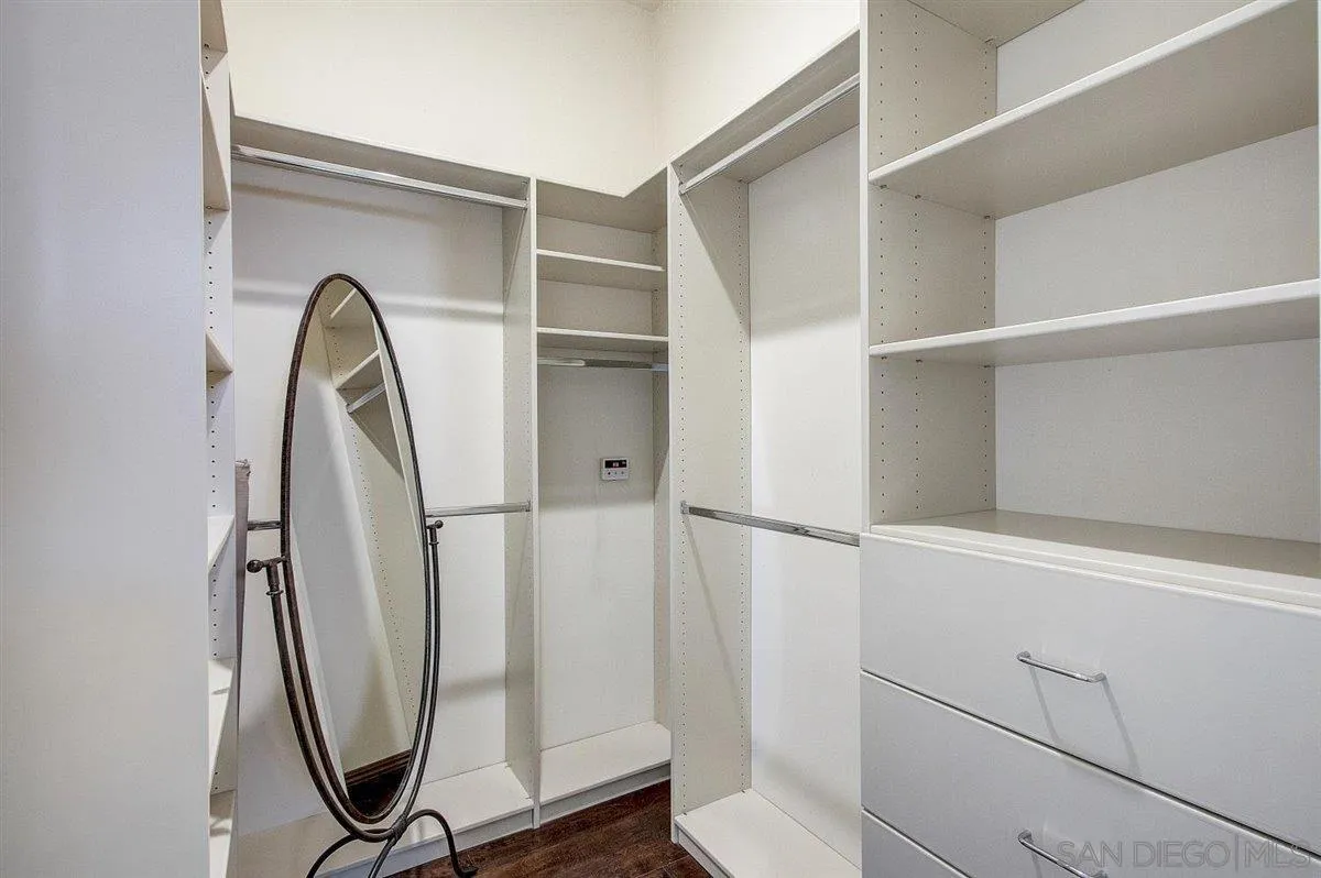4349 Fallsbrae Road Fallbrook, CA 92028 - Photo 32 of 68 a view of walk in closet with empty racks