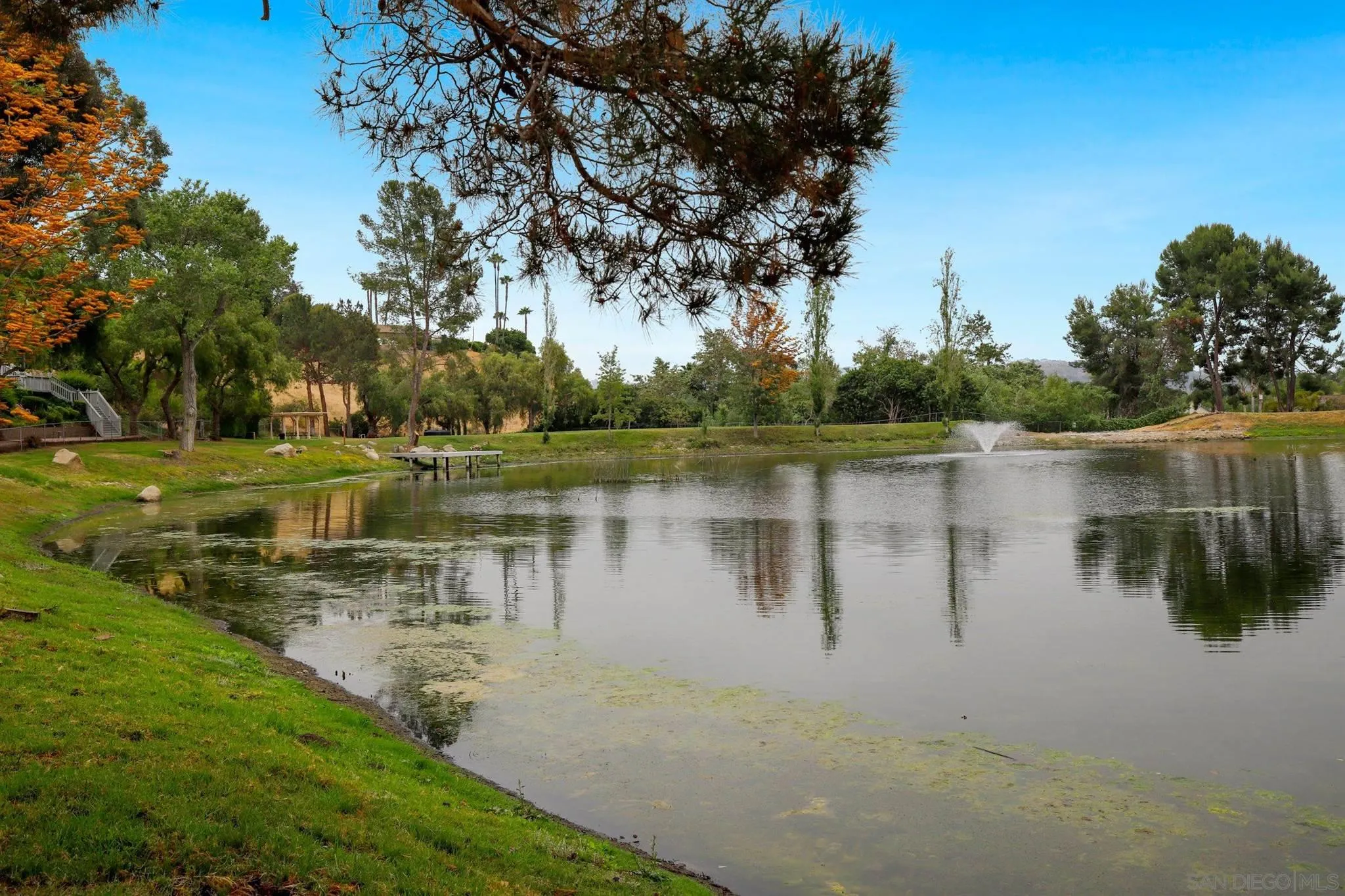 4349 Fallsbrae Road Fallbrook, CA 92028 - Photo 60 of 68 a view of a lake with houses in the back