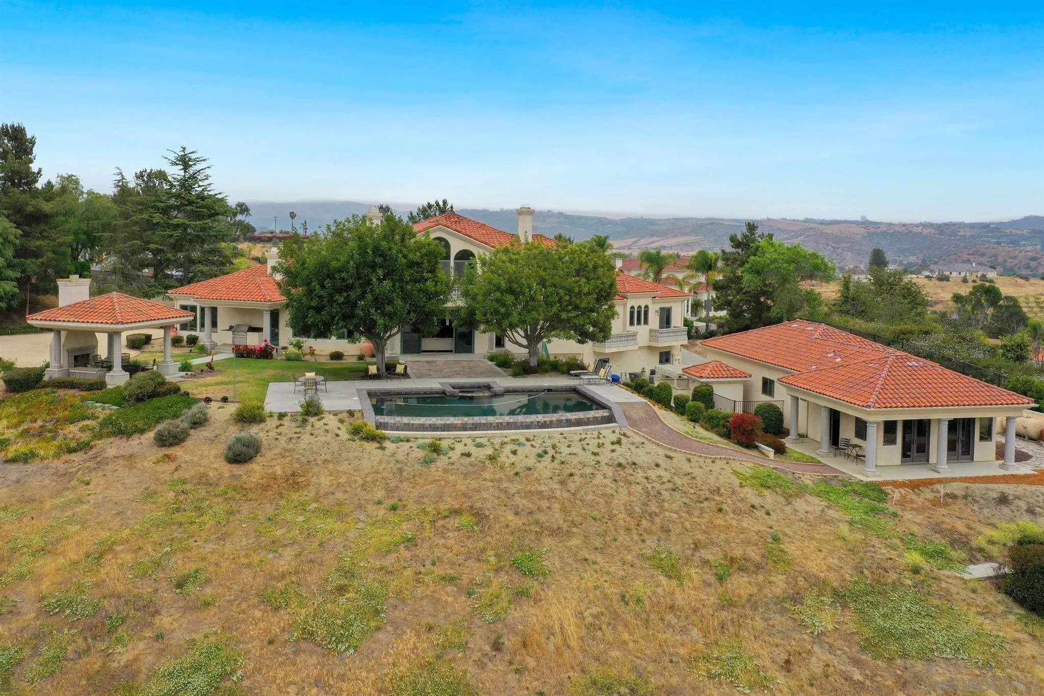 4349 Fallsbrae Road Fallbrook, CA 92028 - Photo 67 of 68 a view of a house with swimming pool and sitting area