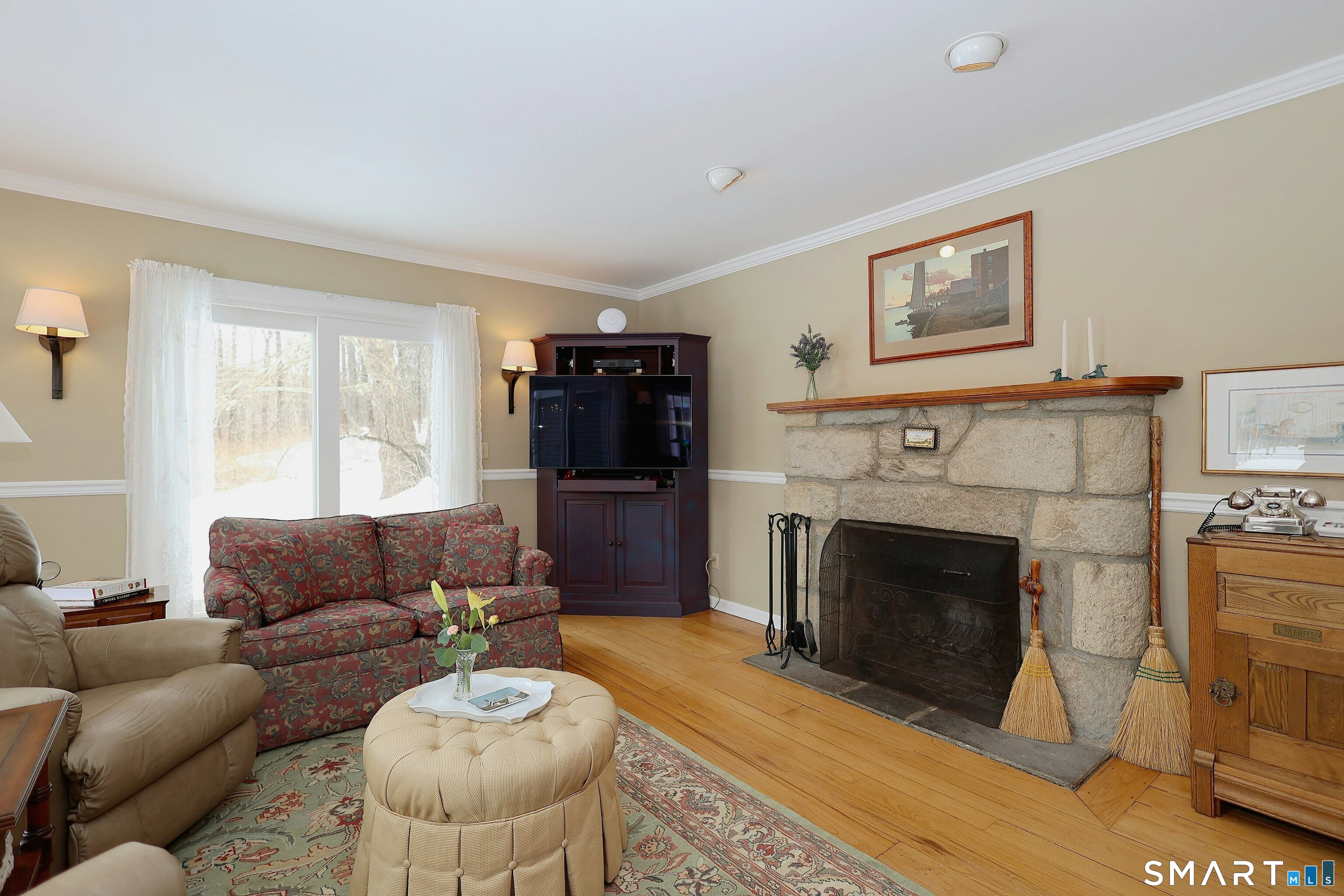 36-40 Fox Run Road Redding, CT 06896 - Photo 15 of 40 a living room with furniture and a fireplace