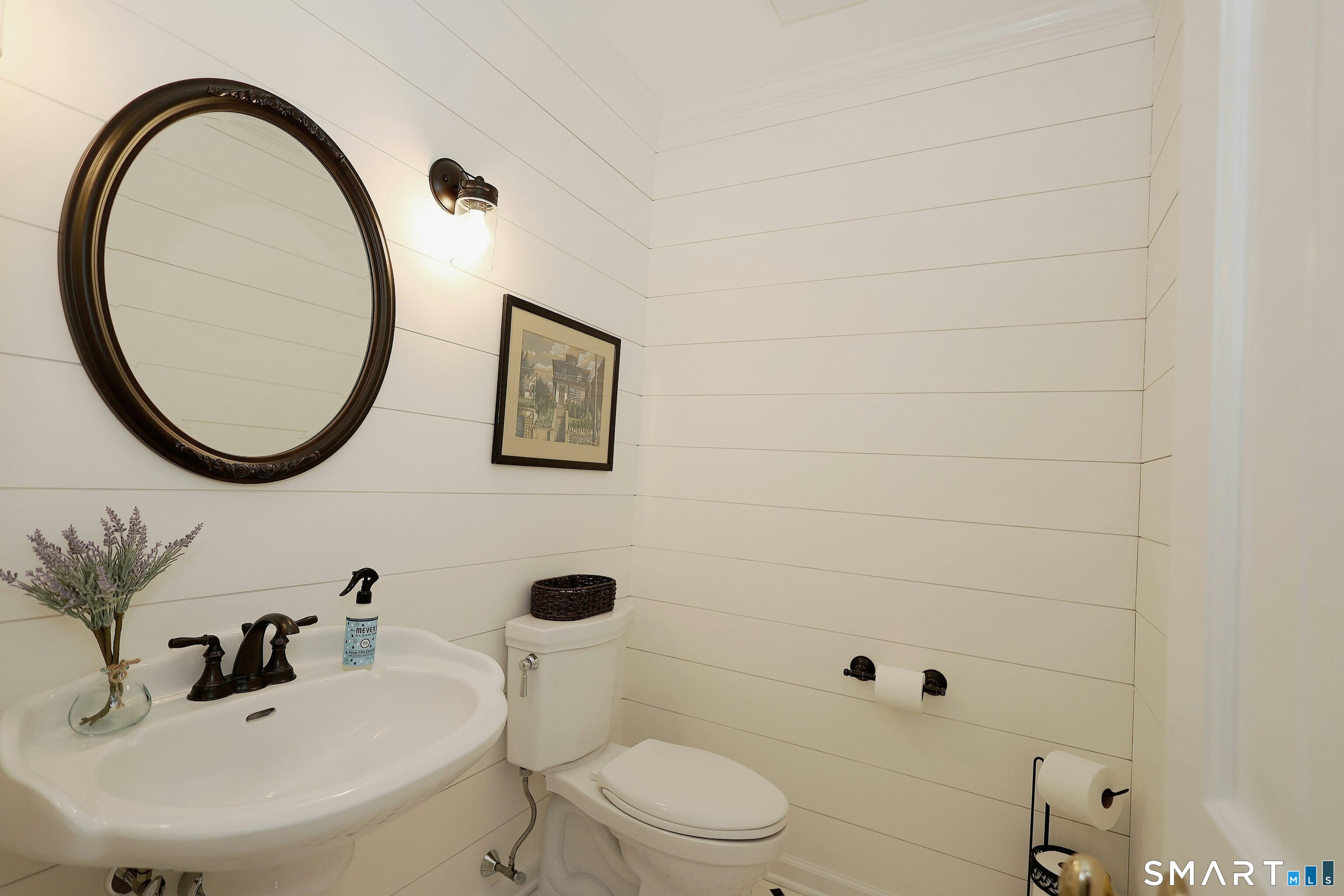 36-40 Fox Run Road Redding, CT 06896 - Photo 20 of 40 a bathroom with a sink a toilet and a mirror