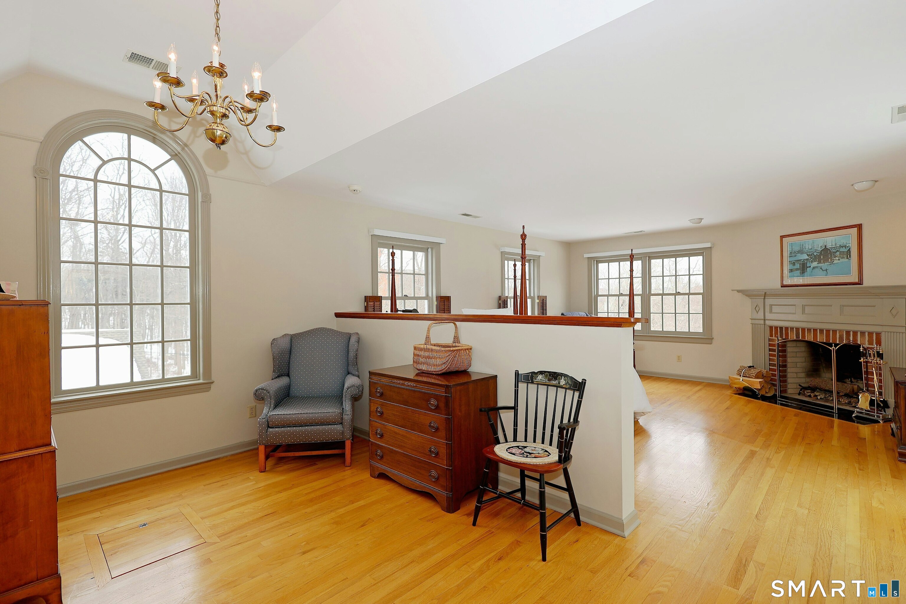 36-40 Fox Run Road Redding, CT 06896 - Photo 22 of 40 a living room with furniture and a fireplace