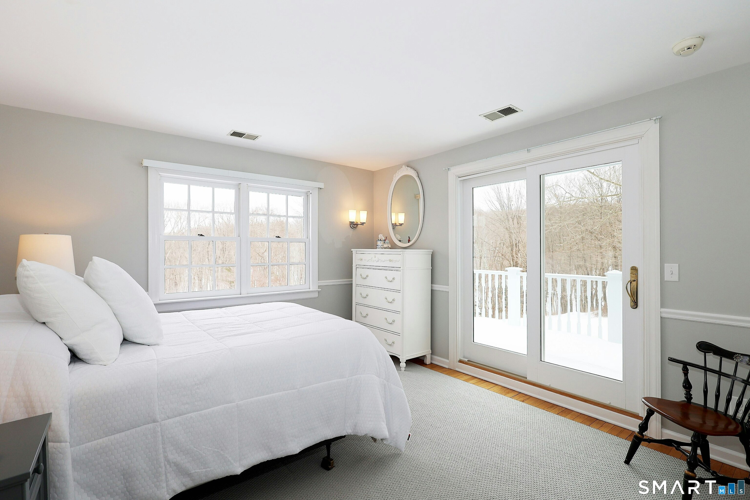 36-40 Fox Run Road Redding, CT 06896 - Photo 26 of 40 a bedroom with a bed a table and a large window