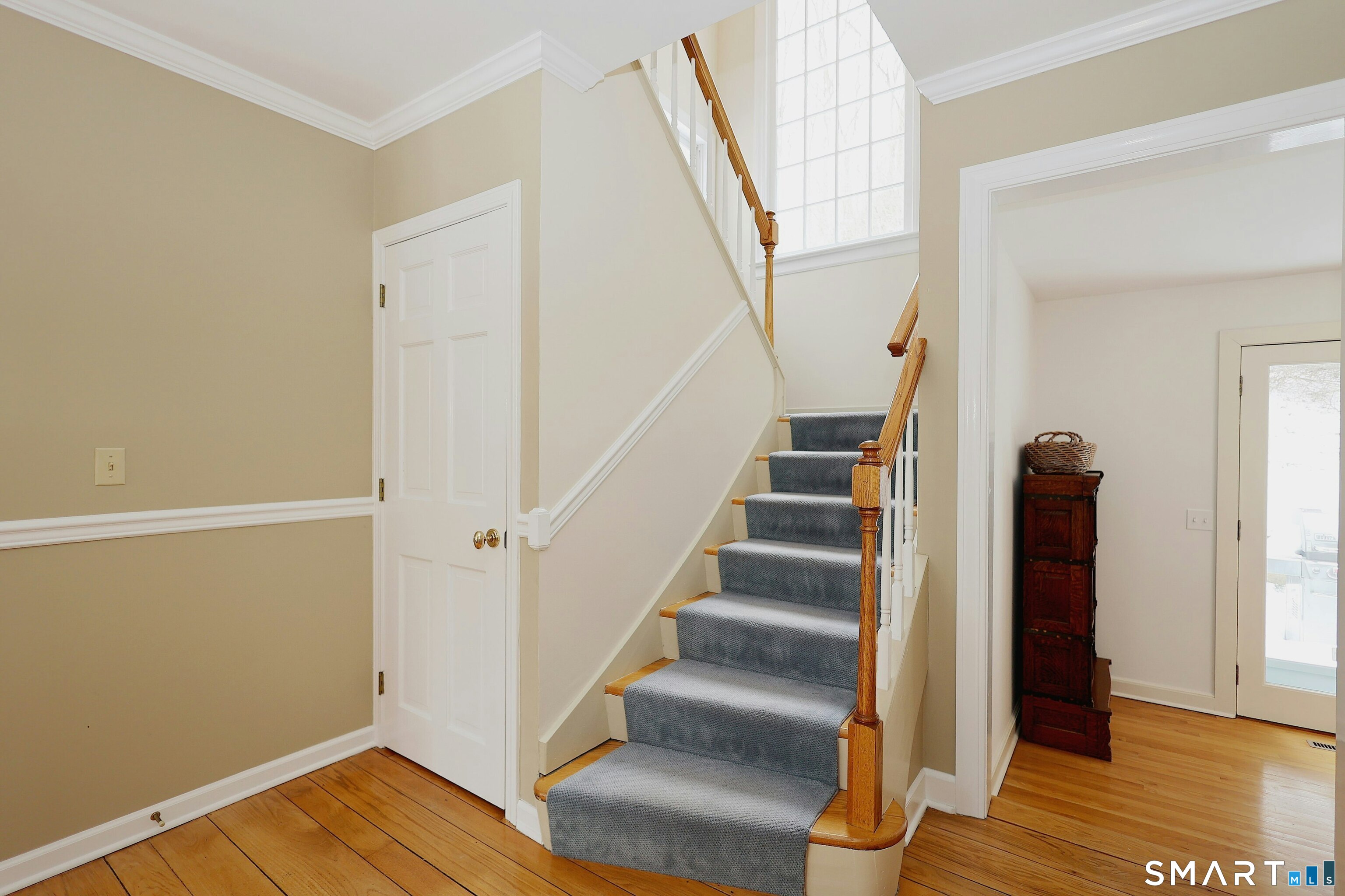 36-40 Fox Run Road Redding, CT 06896 - Photo 30 of 40 a view of entryway with wooden floor and stairs
