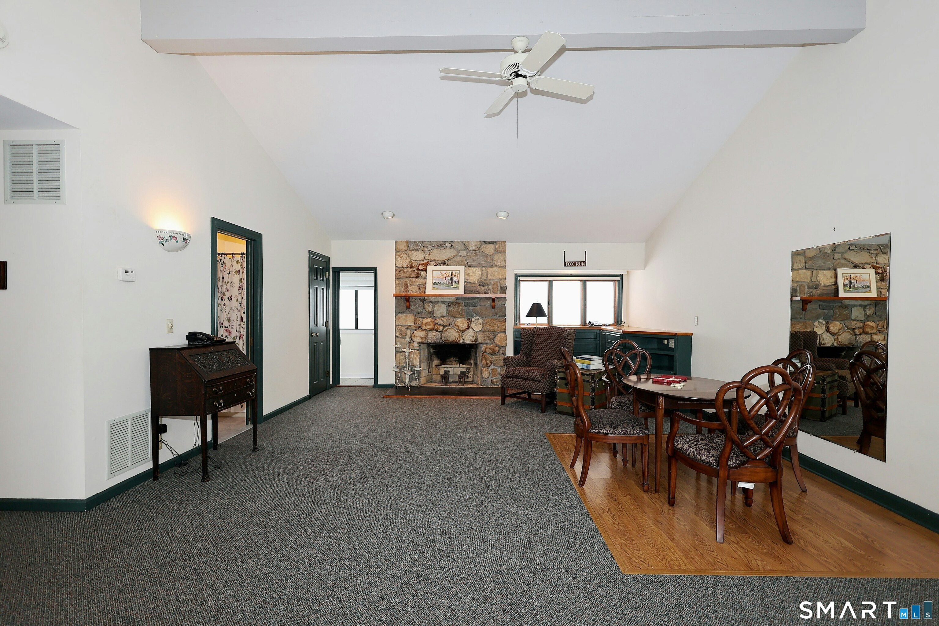 36-40 Fox Run Road Redding, CT 06896 - Photo 34 of 40 a living room with furniture and a window