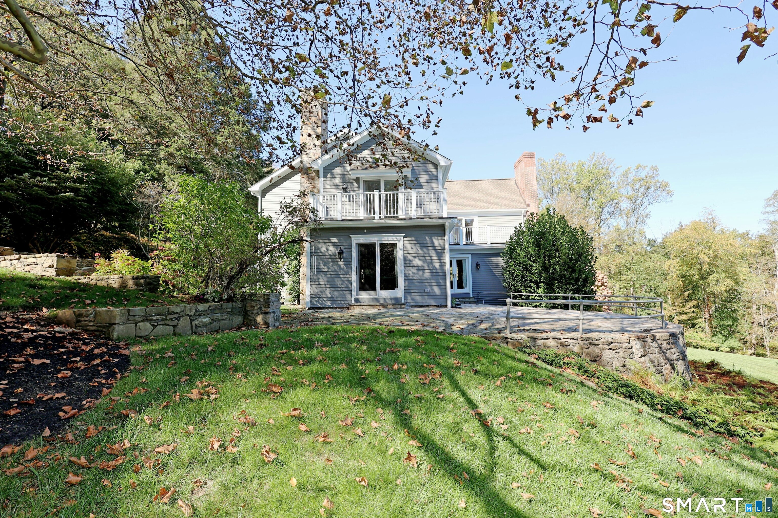 36-40 Fox Run Road Redding, CT 06896 - Photo 39 of 40 a front view of a house with a garden