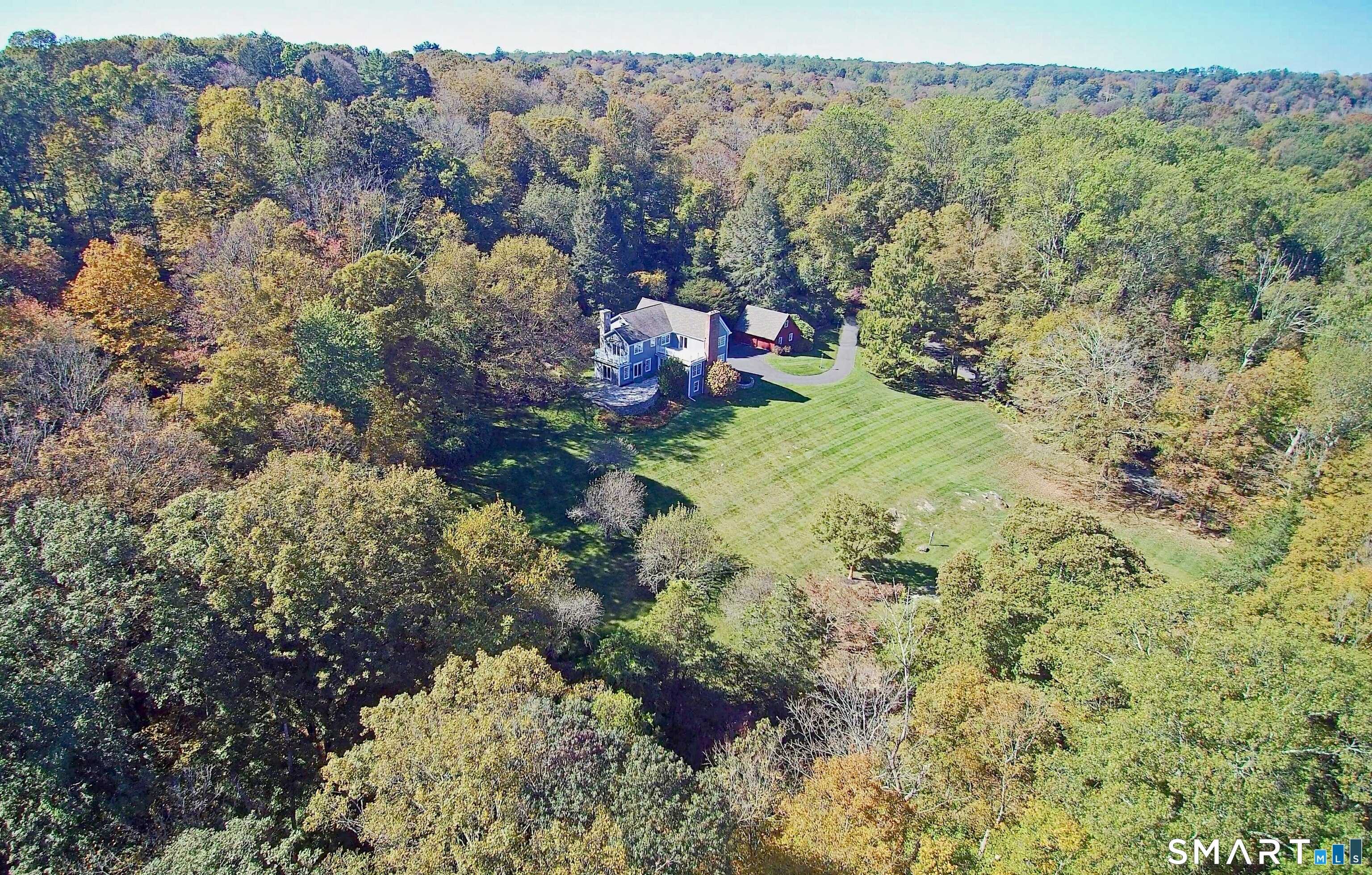 36-40 Fox Run Road Redding, CT 06896 - Photo 40 of 40 a view of a lush green forest with lots of trees