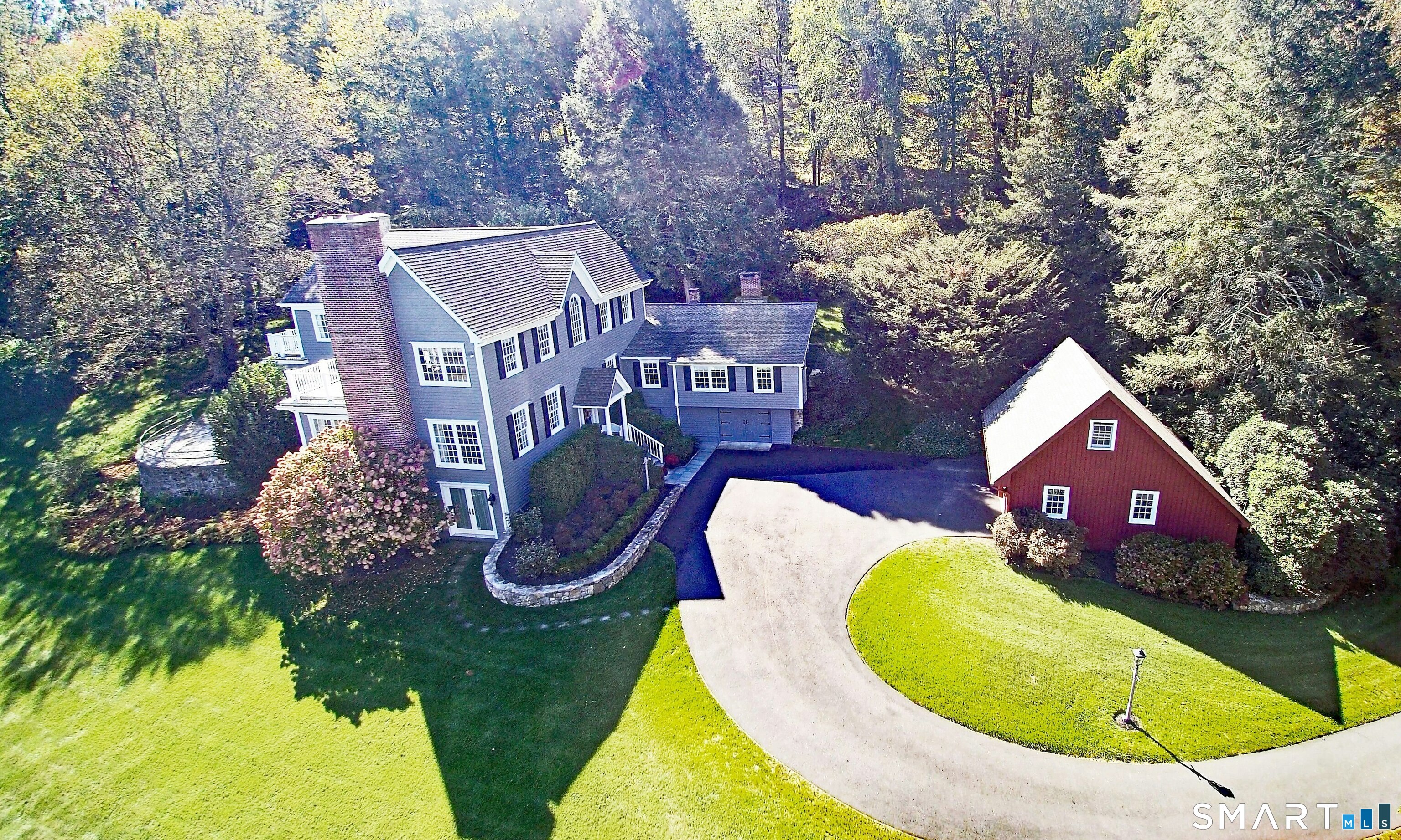 36-40 Fox Run Road Redding, CT 06896 - Photo 8 of 40 a aerial view of a house with swimming pool and trees