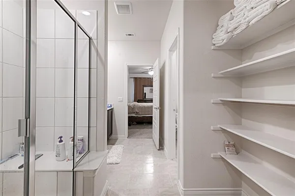 a view of a hallway with closet