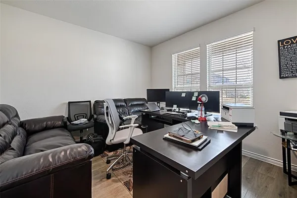 a living room with furniture and window