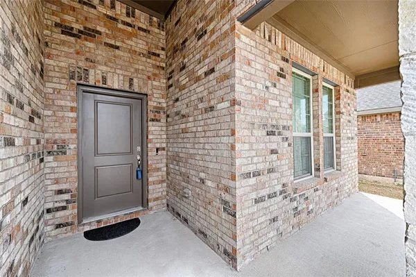 a bathroom with a walk in closet