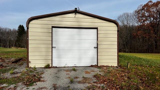 1287 Shaffer Road Ellwood City, PA 16117 - Photo 2 of 11 a front view of a house with a yard