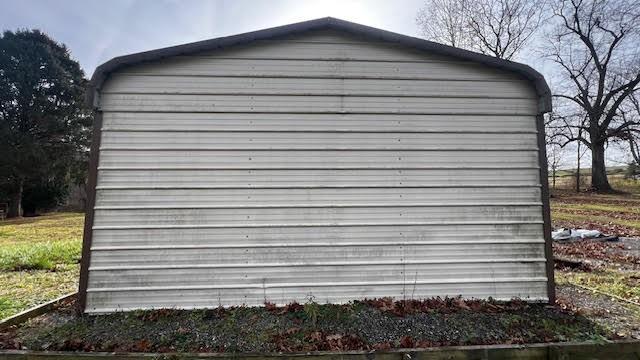 1287 Shaffer Road Ellwood City, PA 16117 - Photo 5 of 11 a front view of a house with garden