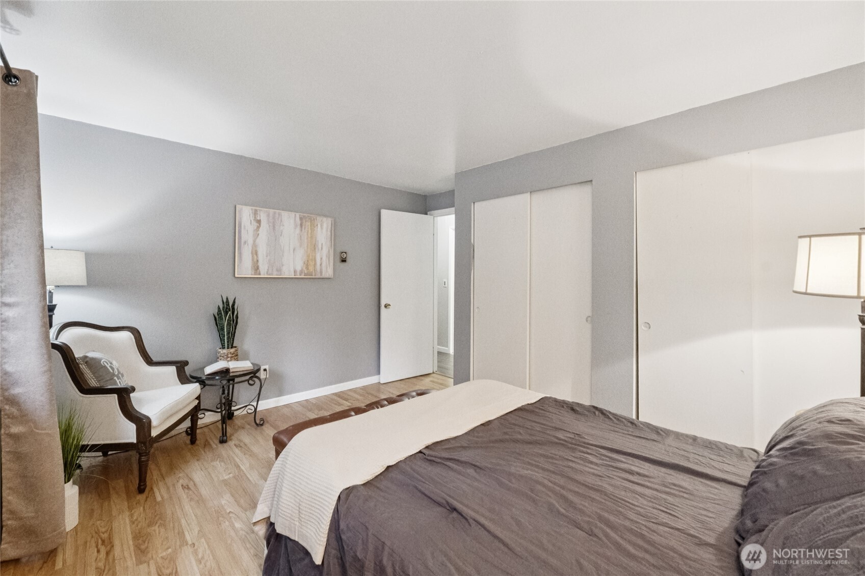 20911 West Richmond Road Bothell, WA 98021 - Photo 20 of 25 a bedroom with a bed chair and window