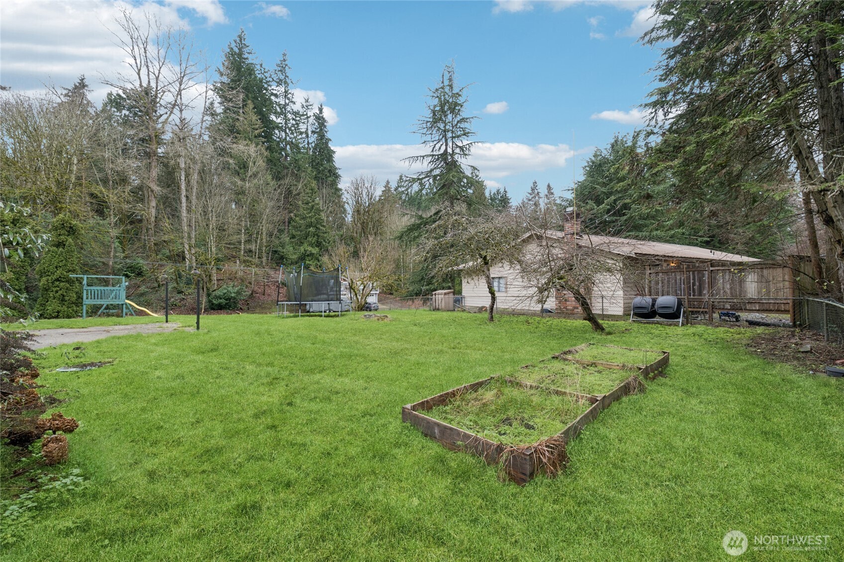 20911 West Richmond Road Bothell, WA 98021 - Photo 25 of 25 a view of a house with backyard