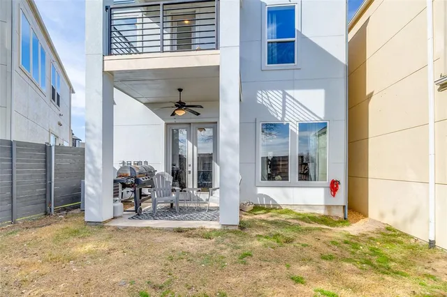 a view of a balcony with chairs and a table