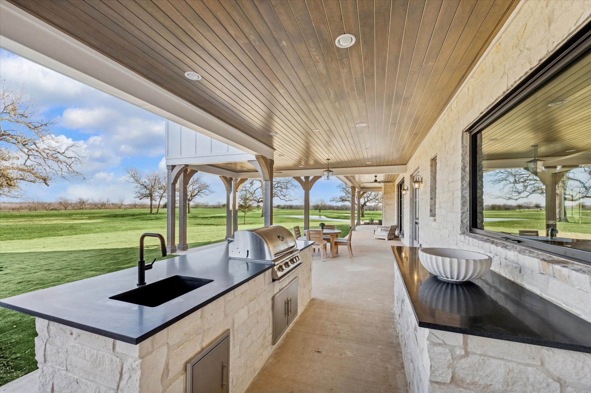 5655 Brazos Bow Way Washington, TX 77880 - Photo 12 of 46 Imagine the good times you will have on the grill, hanging with friends and enjoying this incredible view.