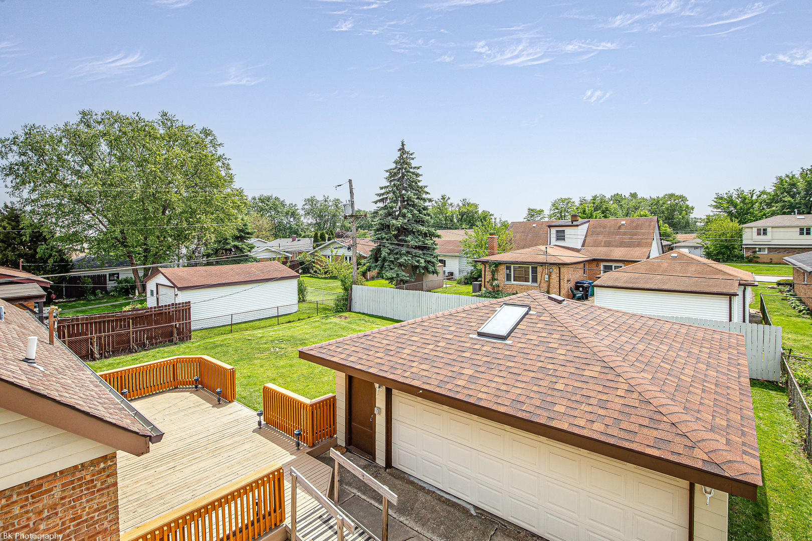 7049 West 91st Street Bridgeview, IL 60455 - Photo 19 of 25 a view of a rooftop deck with couch and chairs