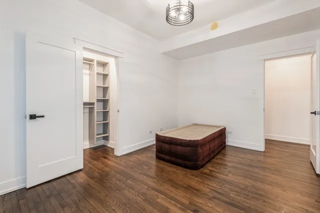 a kitchen with a sink stainless steel appliances and cabinets