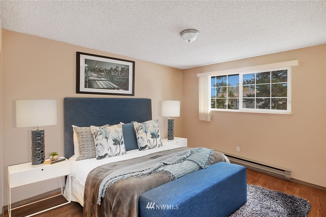 3910 Mason Loop Road Tacoma, WA 98409 - Photo 5 of 9 a bedroom with bed and window