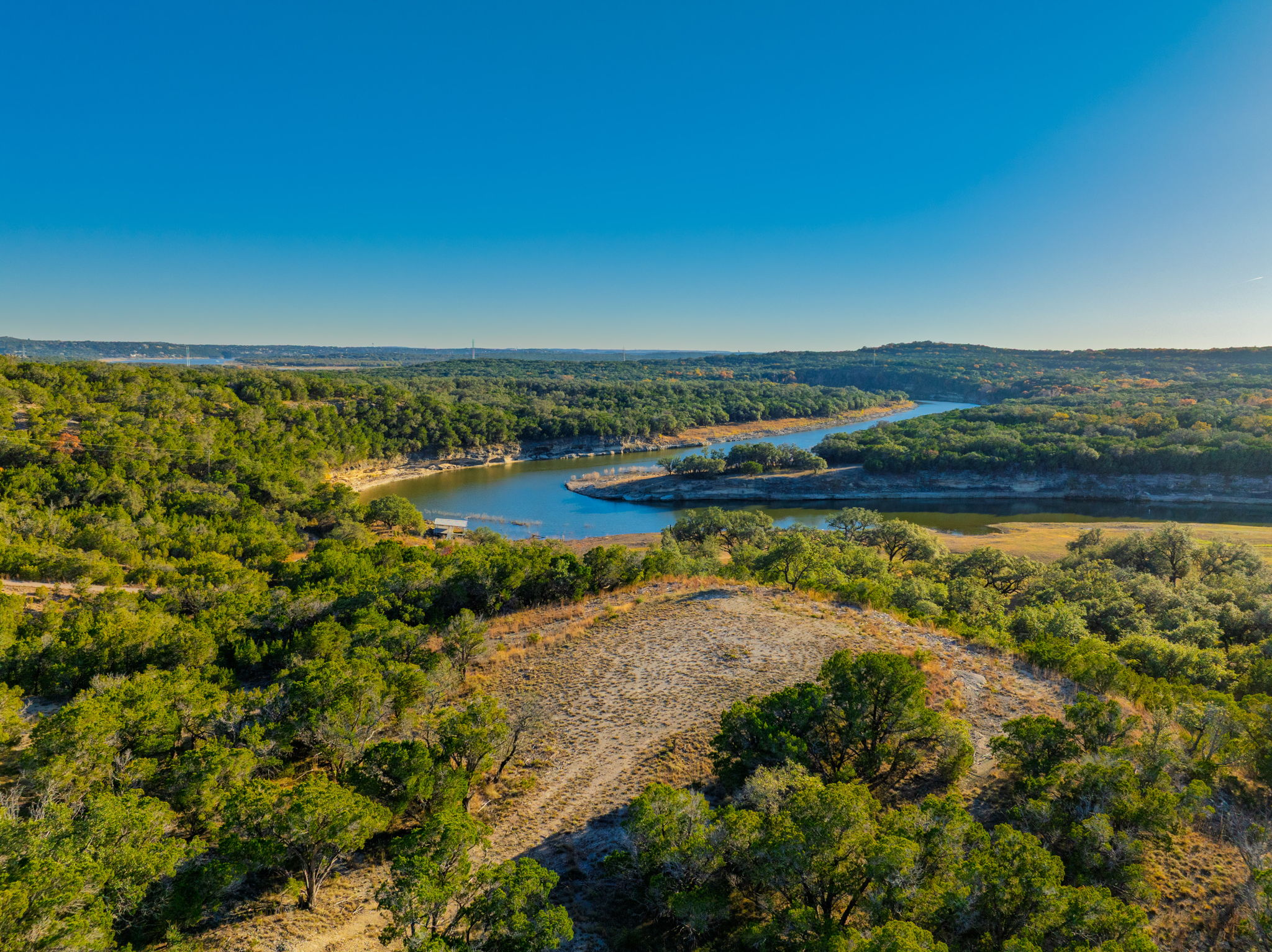 24105 Ranch To Market 1431 Marble Falls, TX 78654 - Photo 1 of 16 a view of a lake with a city