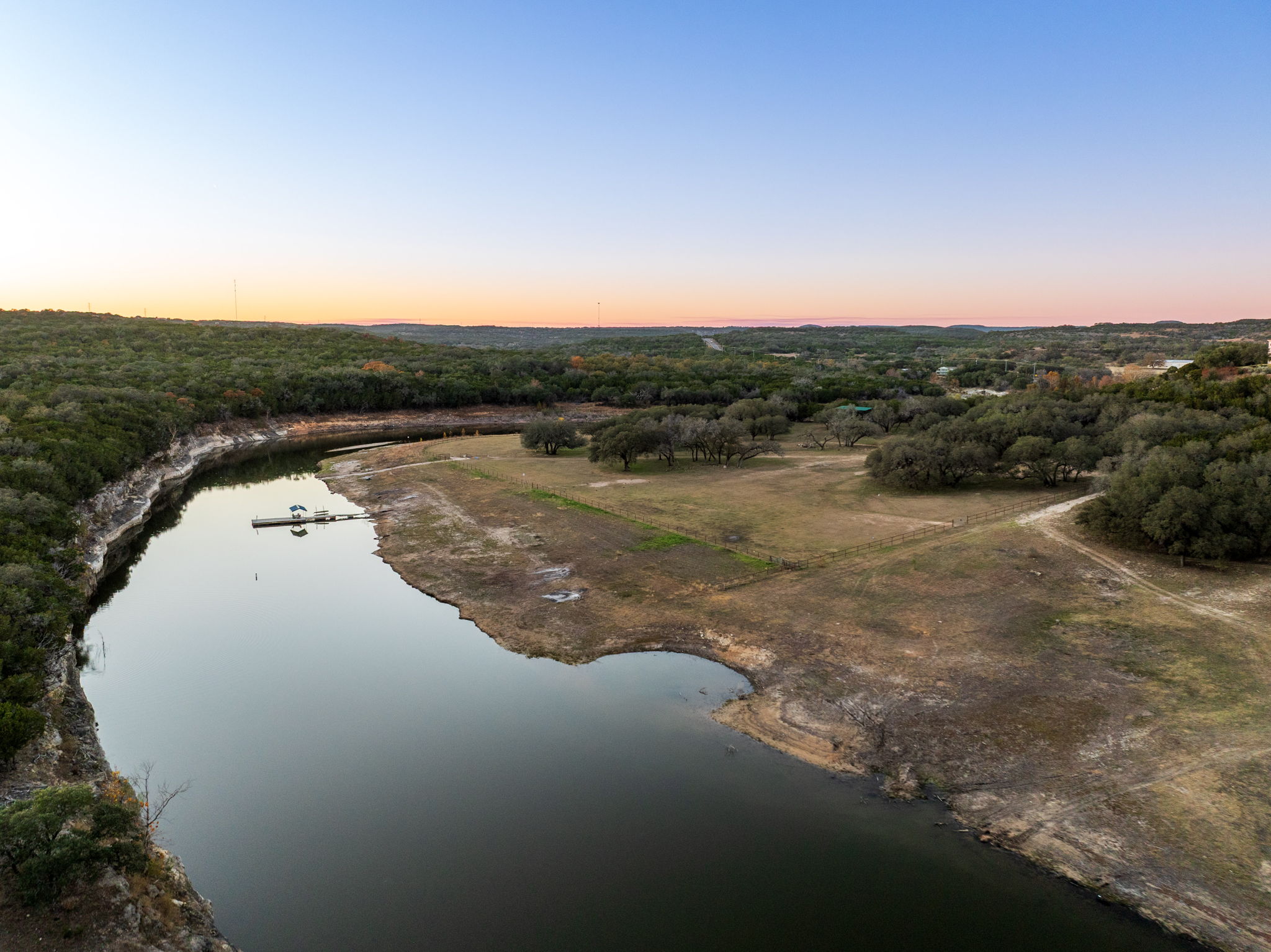24105 Ranch To Market 1431 Marble Falls, TX 78654 - Photo 14 of 16 a view of a lake with mountain in the background