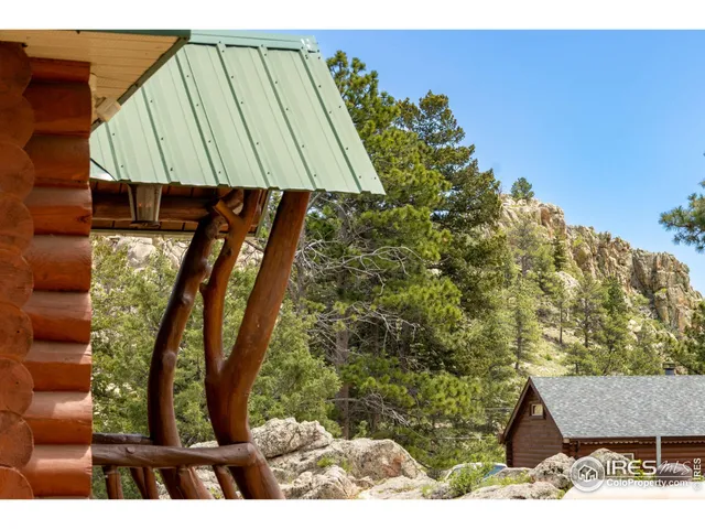 a view of a yard from a balcony