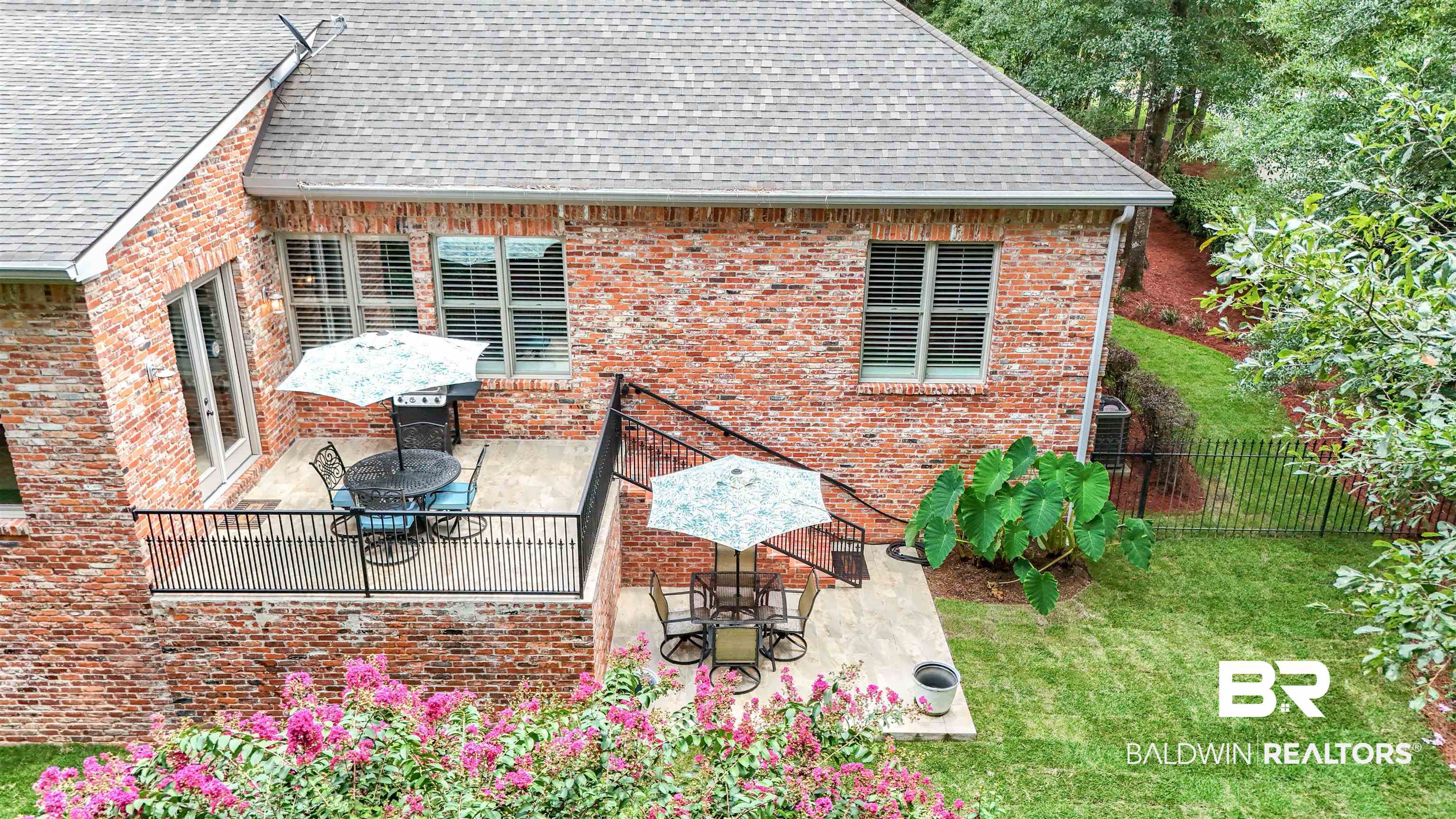 11281 Redfern Road Daphne, AL 36526 - Photo 79 of 80 Back of property with a lawn and a patio