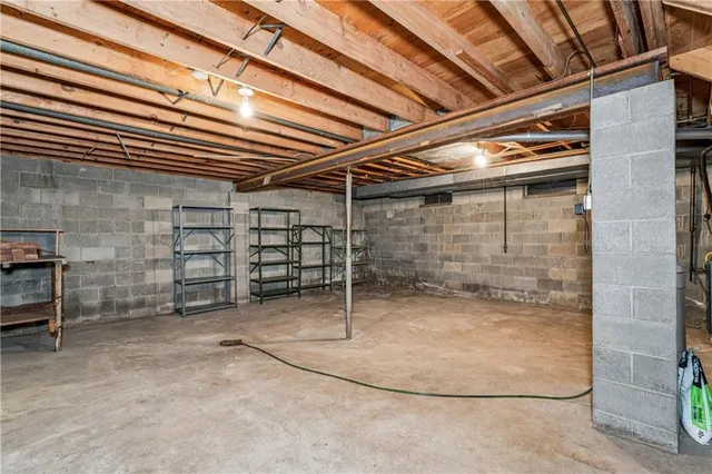 a view of a room with wooden walls