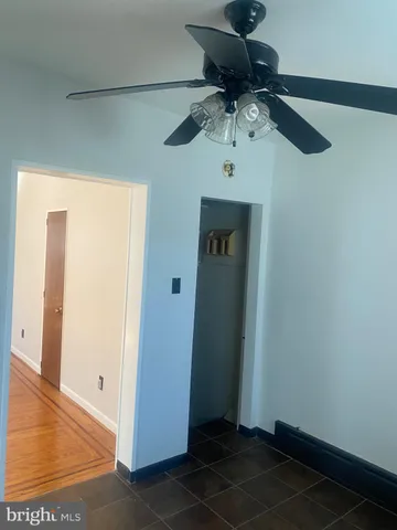 a view of a hallway with a closet