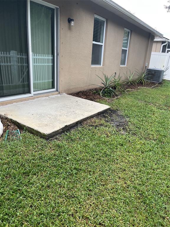 526 Safe Harbor Drive Edgewater, FL 32141 - Photo 6 of 7 a view of a backyard of the house
