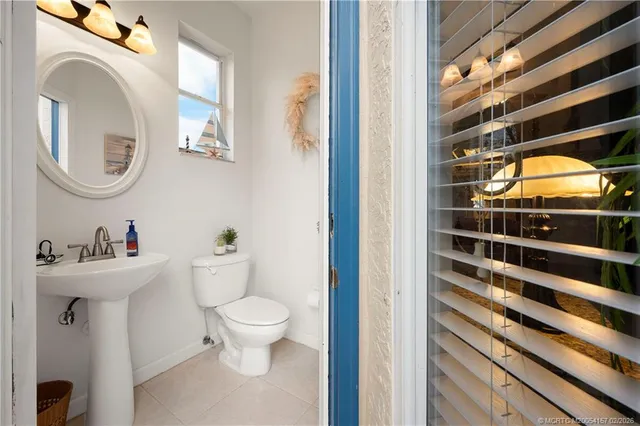 an aerial view of house with yard