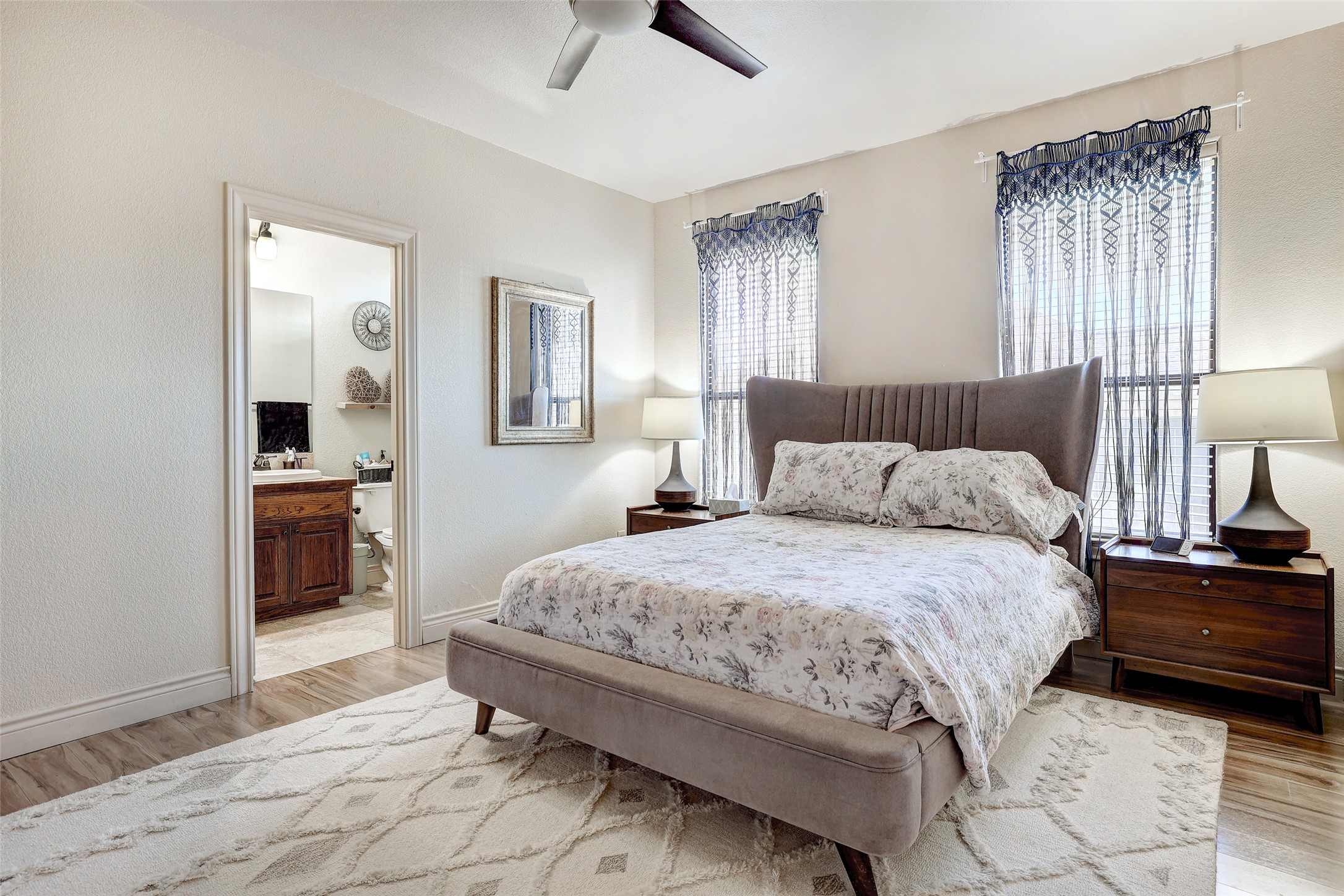 Undisclosed Address Georgetown, TX 78633 - Photo 26 of 39 a bedroom with a bed and a chandelier