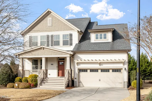 a front view of a house with a porch