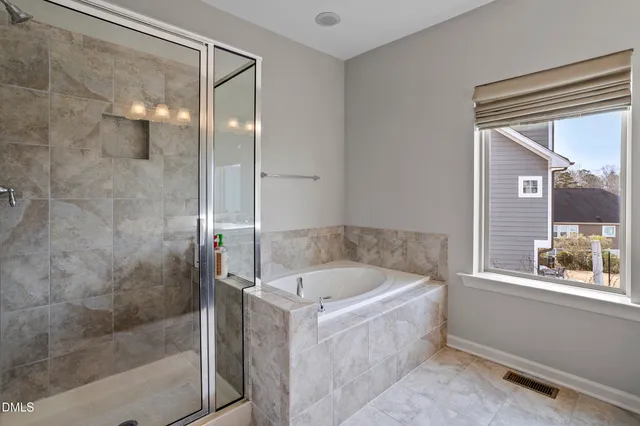 a living room with furniture and windows