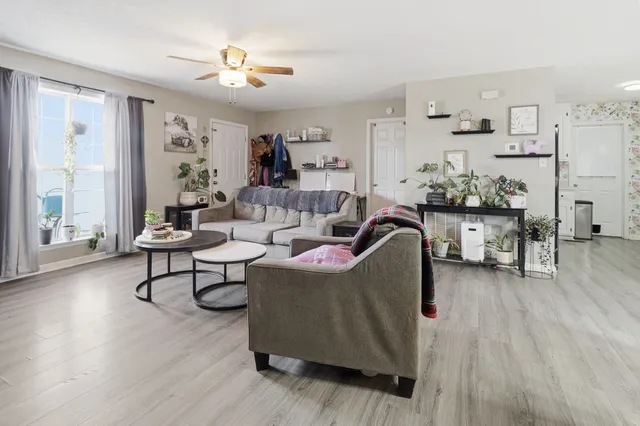 a kitchen with granite countertop a refrigerator and a stove