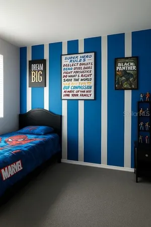 a bedroom with a bed and wall paintings