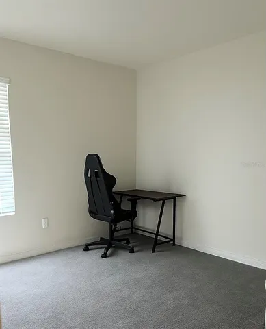 a view of workspace with chair