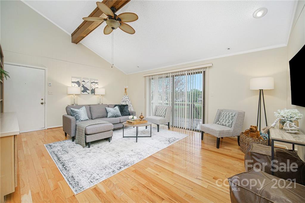 8001 Rising Meadow Road Charlotte, NC 28277 - Photo 21 of 40 a living room with furniture and a table