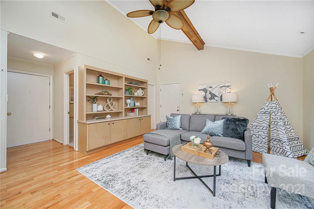8001 Rising Meadow Road Charlotte, NC 28277 - Photo 22 of 40 a living room with furniture and a rug