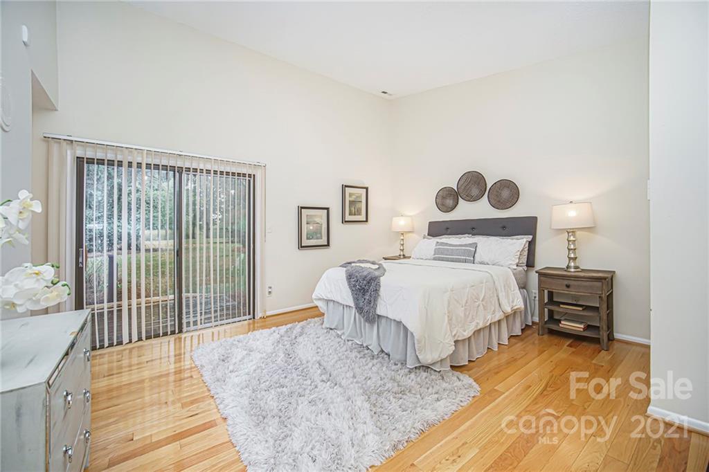 8001 Rising Meadow Road Charlotte, NC 28277 - Photo 30 of 40 a bedroom with a bed and a window