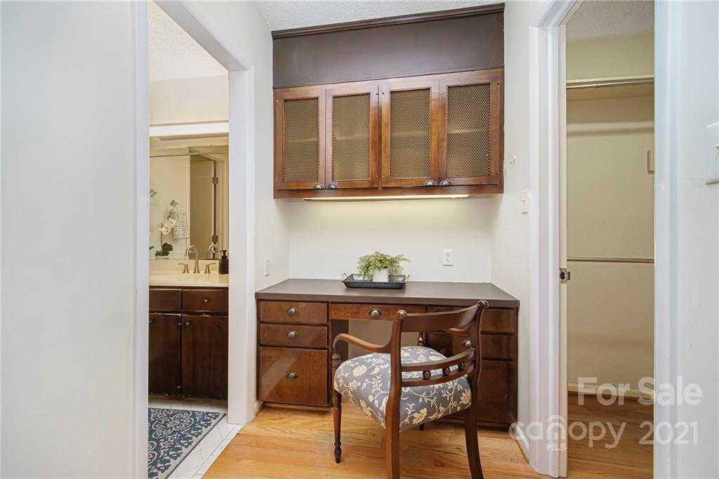 8001 Rising Meadow Road Charlotte, NC 28277 - Photo 31 of 40 a room that has a dresser and a chair in it