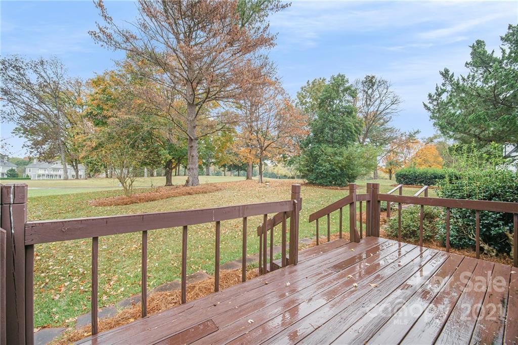 8001 Rising Meadow Road Charlotte, NC 28277 - Photo 37 of 40 a view of a deck with mountain view and wooden floor