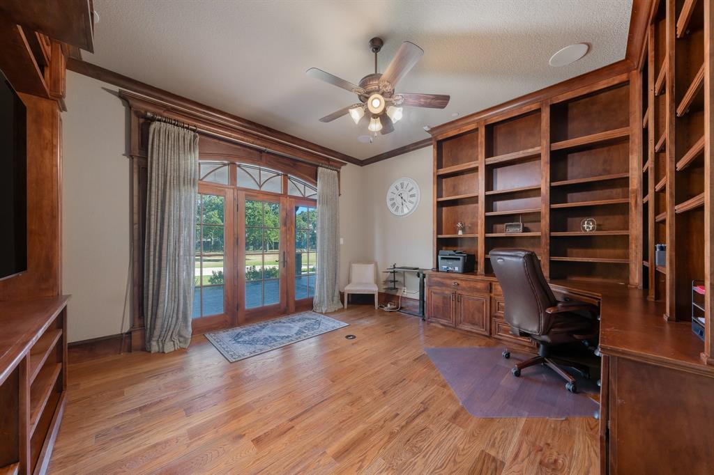 594 Turner Warnell Road Mansfield, TX 76063 - Photo 24 of 38 Office space featuring a ceiling fan, crown molding, hardwood floors, and french doors